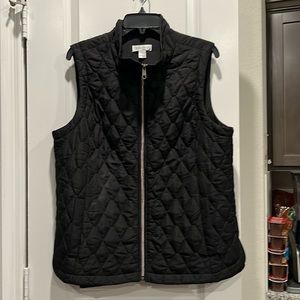 NWOT. Ladies quilted zip front vest by Christopher & Banks. Black and Size XL.